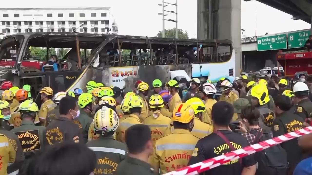 Thai police arrest driver and work to identify victims of school bus fire that killed 23