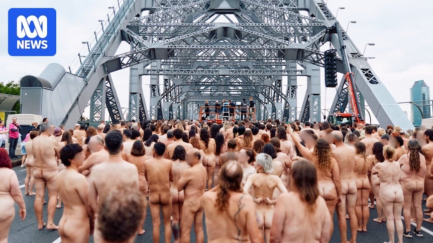 Thousands of naked bodies descend on Brisbane's Story Bridge to celebrate 30 years of Spencer Tunick's art