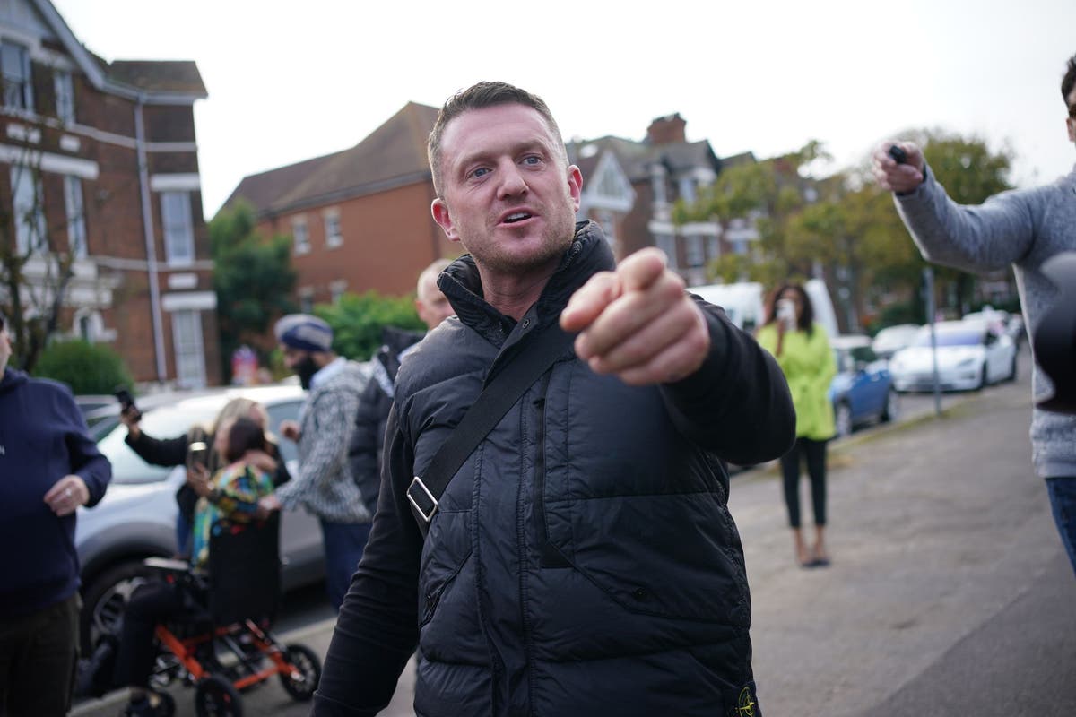 Tommy Robinson charged under Terrorism Act over mobile phone pin