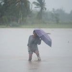 Tropical storm leaves at least 24 dead in flooding and landslides