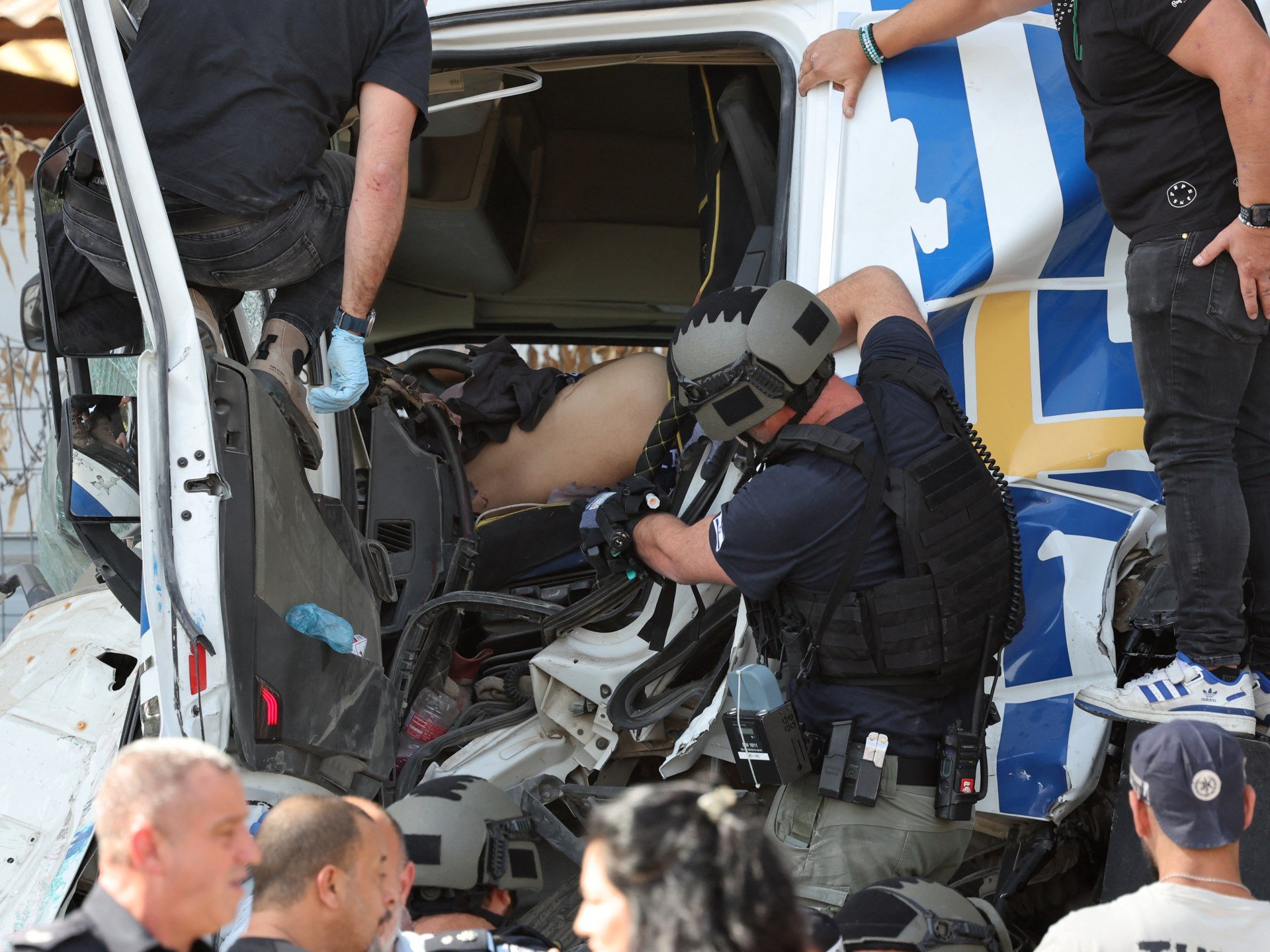 Truck rams into people at Tel Aviv bus stop, wounding dozens