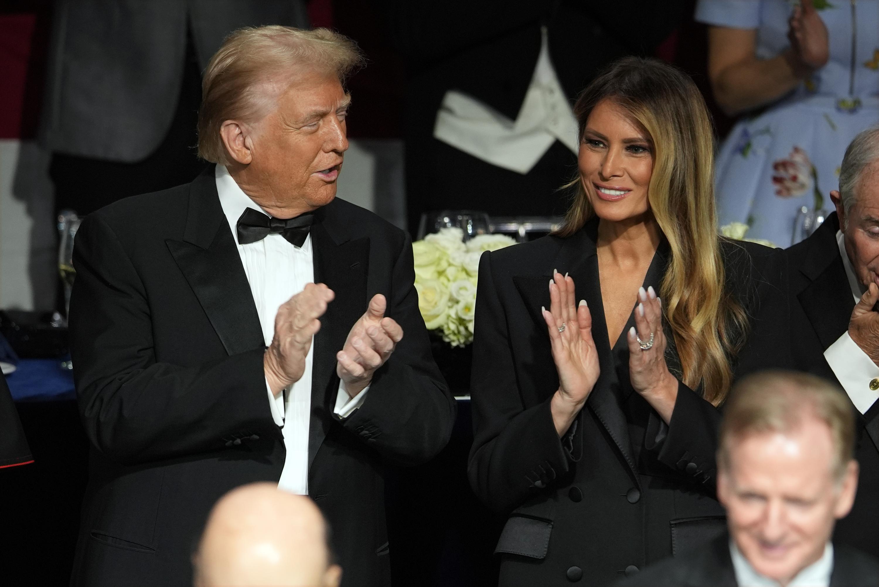 Trump attends Al Smith charity dinner with his wife, Melania, while Harris appears virtually