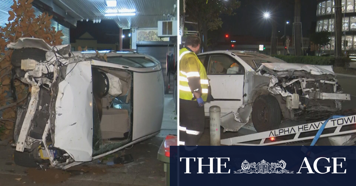 Two men hospitalised after car flipped during pursuit