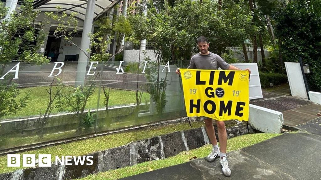 Spanish couple held in Singapore over football protest