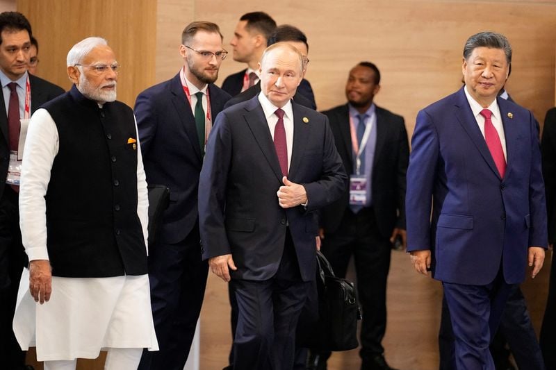 Putin scores a BRICS win with rare Xi and Modi show of harmony