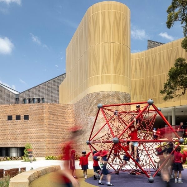 Fjcstudio wraps Sydney school in perforated aluminium facade