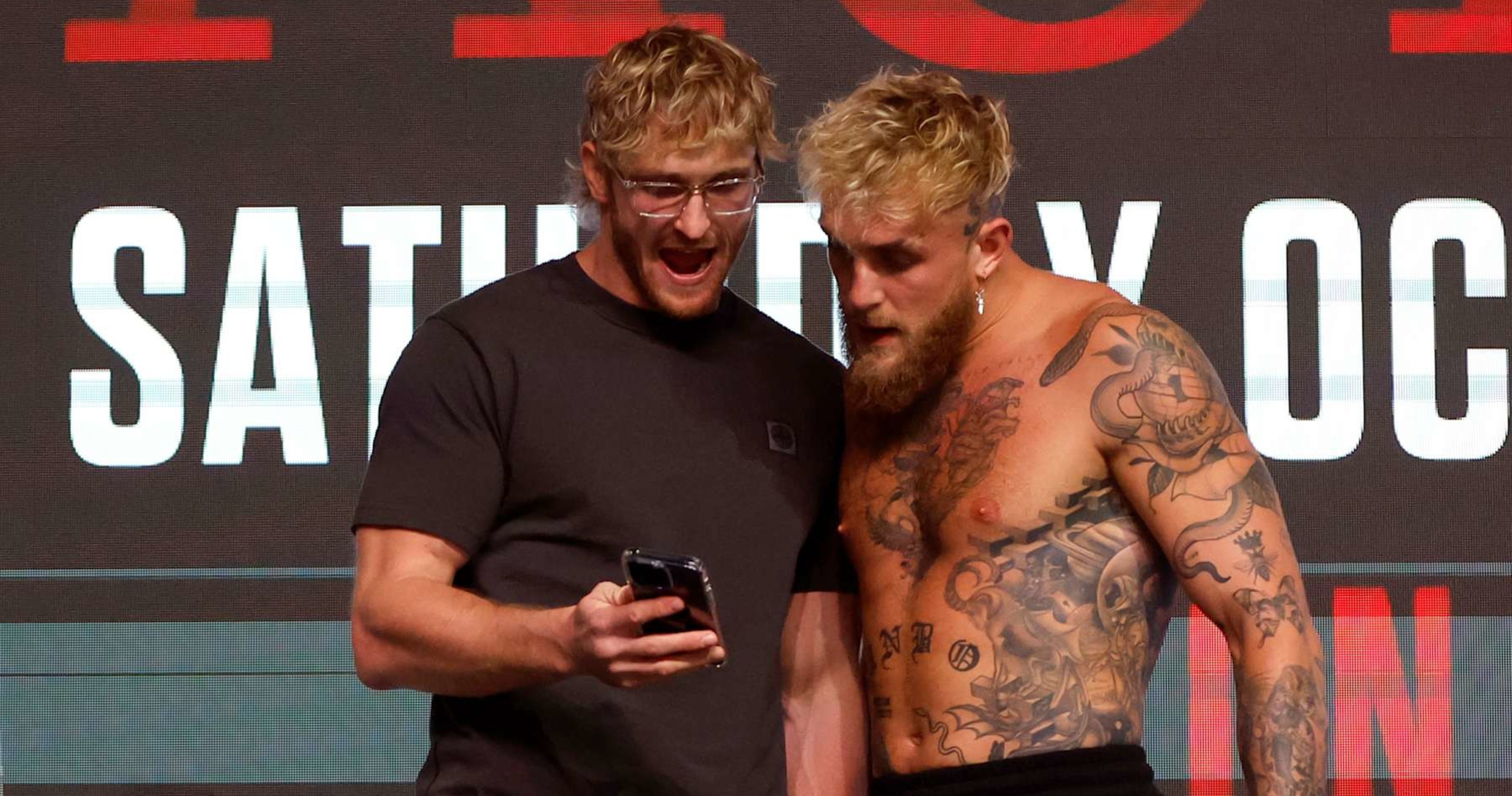 WWE's Logan Paul Reacts to 'F--king Iconic' Mike Tyson-Jake Paul Slap in Viral Video