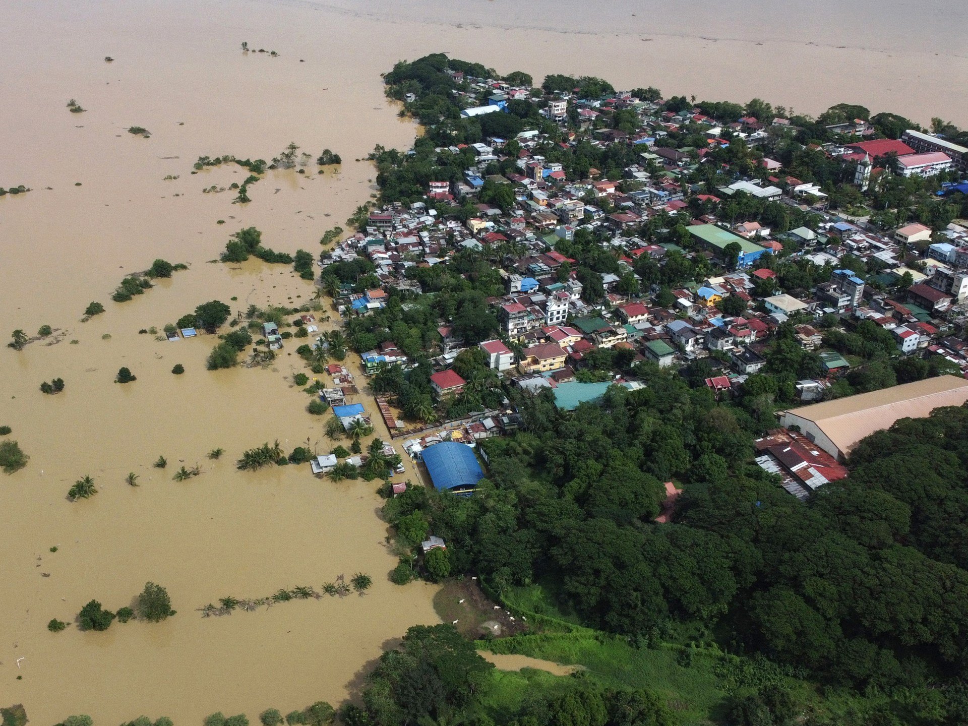 Philippines cleans up as Super Typhoon Man-yi leaves deadly trail