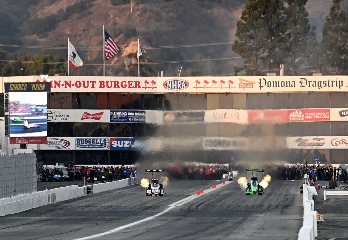 Plane crashes into parking lot near track during NHRA season finale at Pomona Dragstrip