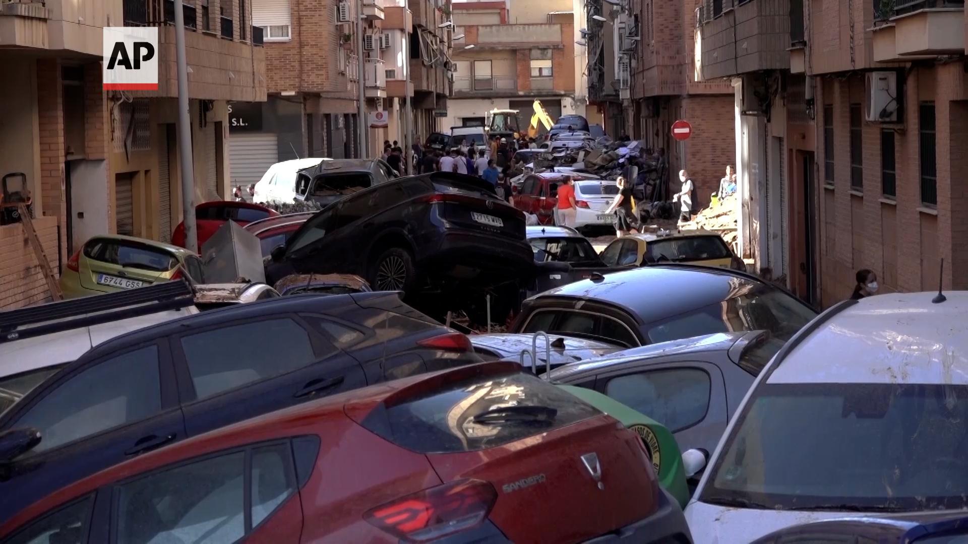 A week after Spain's floods, families hold out hope that loved ones are not among the dead