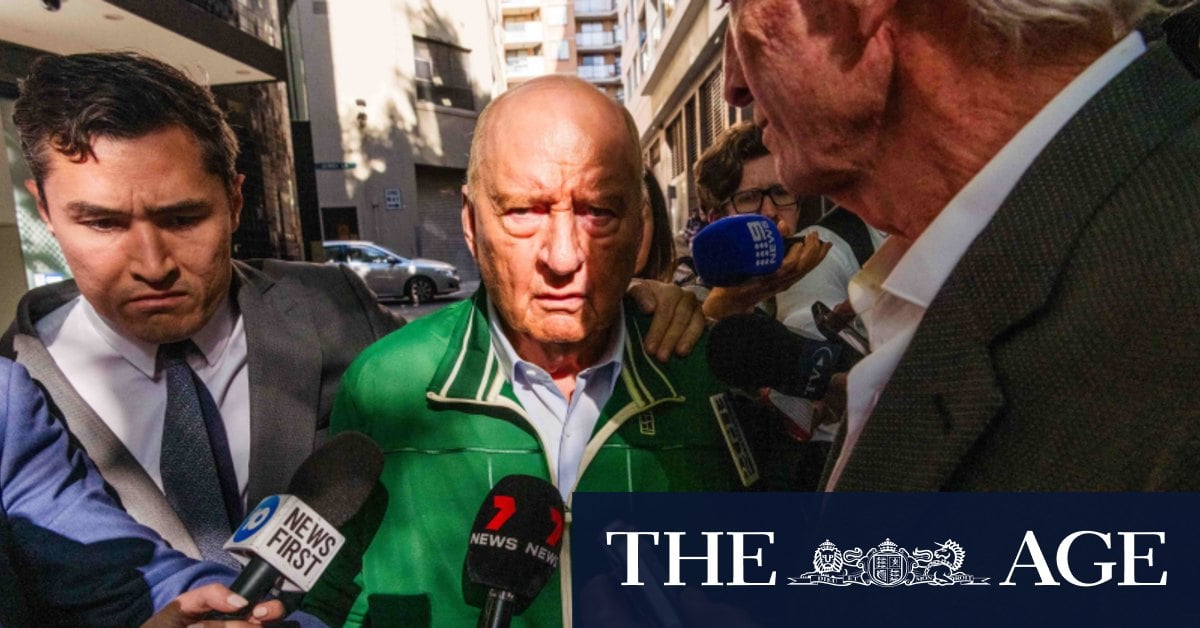 Alan Jones leaves police station after charges laid