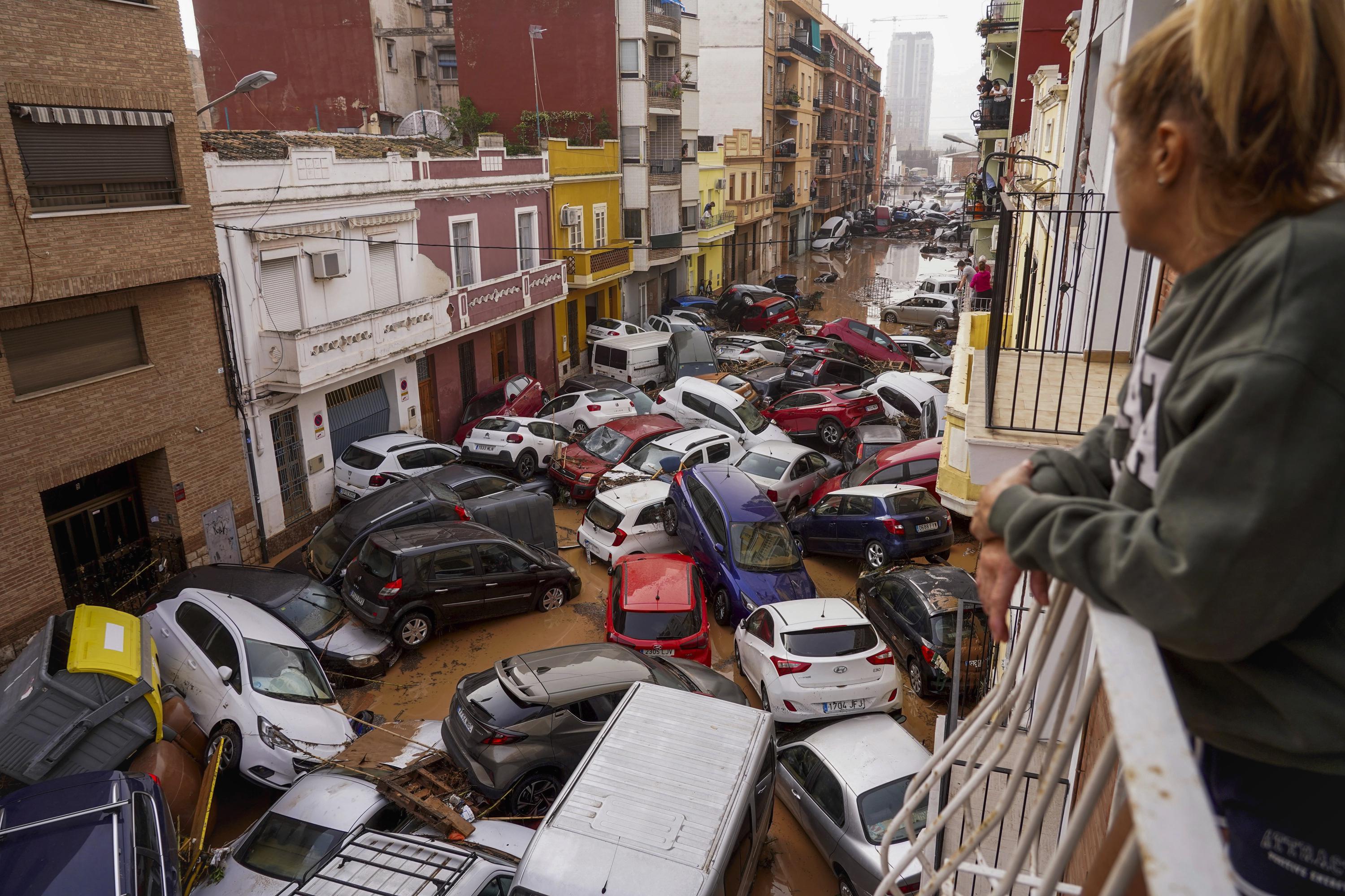 AP PHOTOS: Death by water, burial by mud. Images of Spain's floods of the century