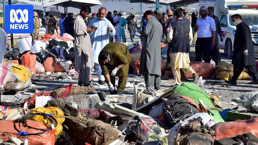 Dozens killed in suicide bombing at train station in south-western Pakistan