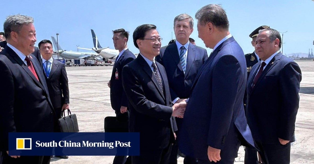 Hong Kong leader John Lee greets Chinese President Xi Jinping in Peru ahead of Apec summit