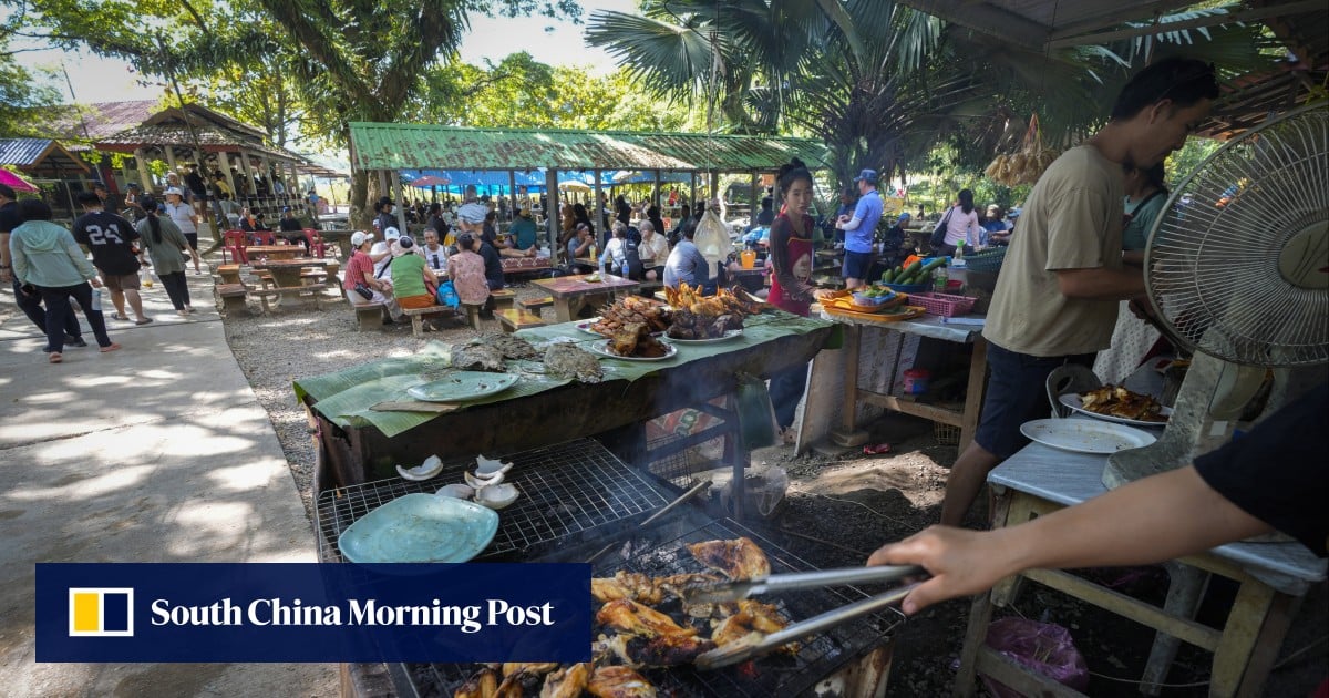 Laos vows justice after tainted alcohol kills tourists