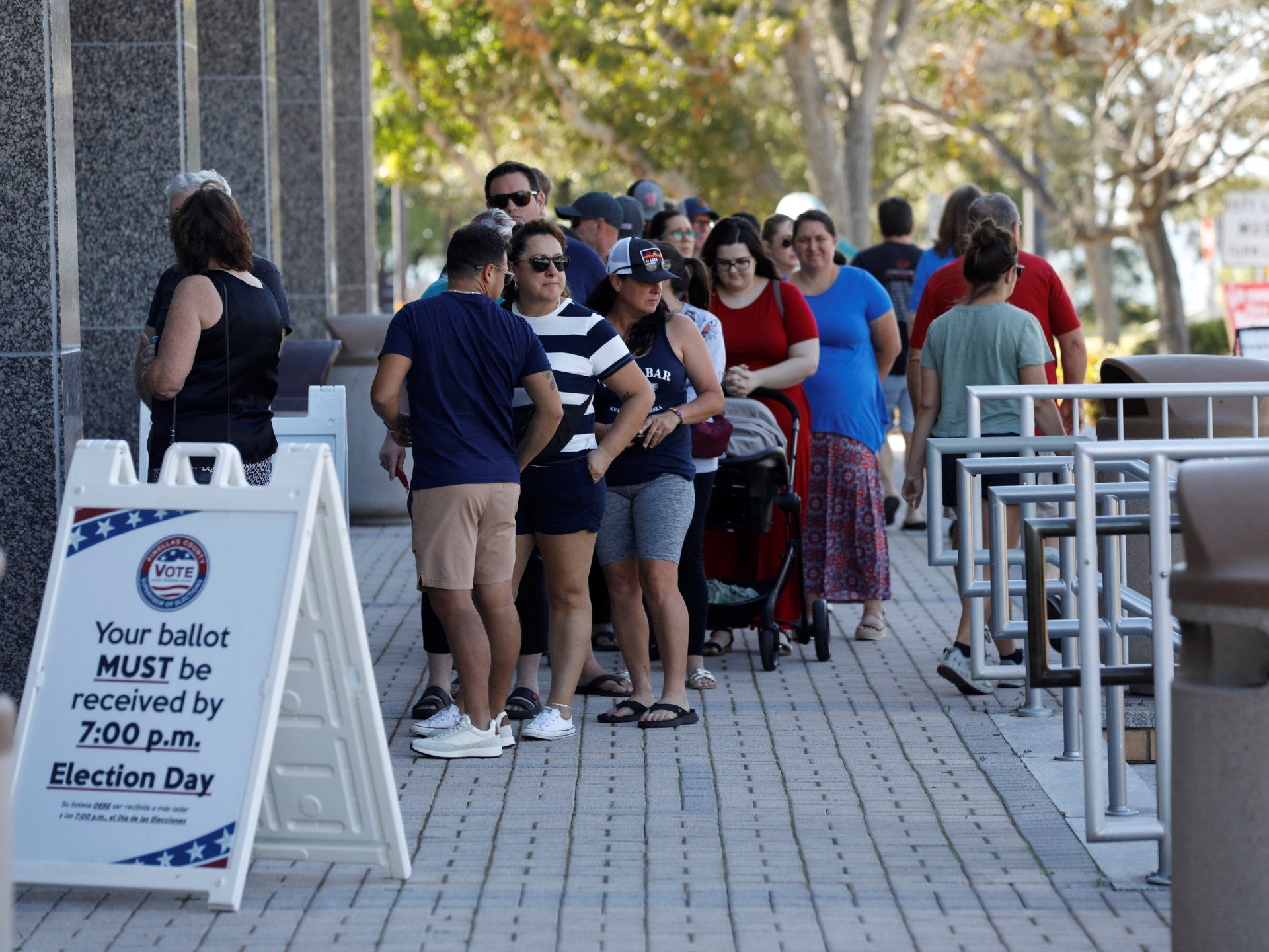 US voters cast ballots with security tight as election campaign nears end