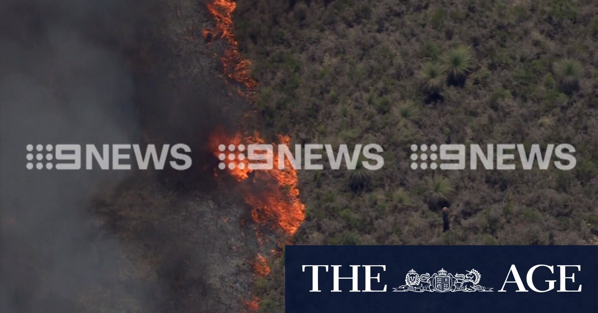 Wedge bushfire forces evacuations after two firefighters injured in blaze