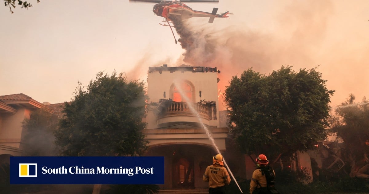 Wildfire near Los Angeles burns dozens of homes, thousands of people told to flee