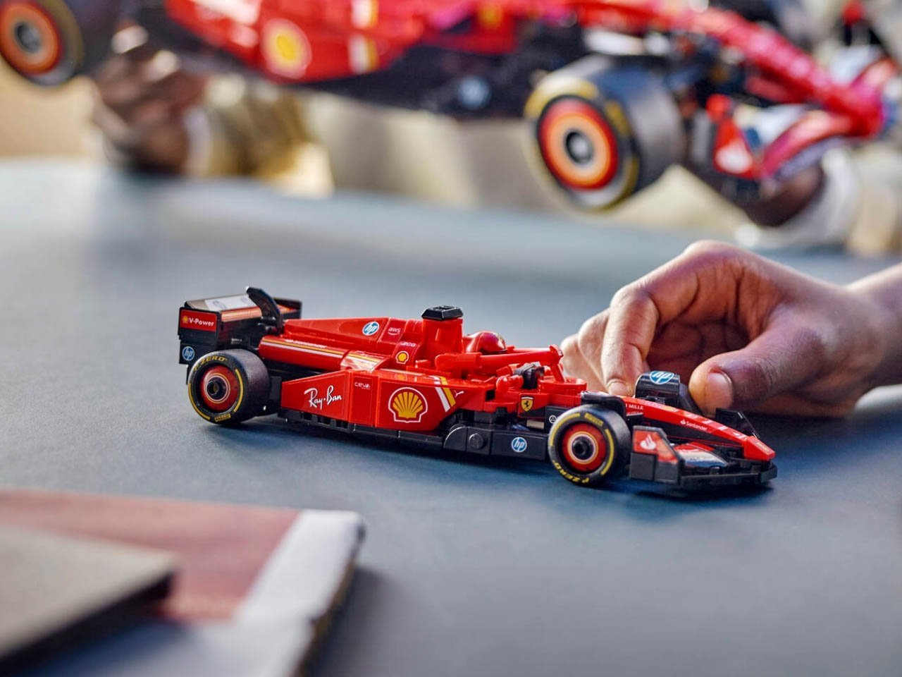 LEGO Ferrari SF-24 Formula 1 car has a functional engine and customizable DRS wing