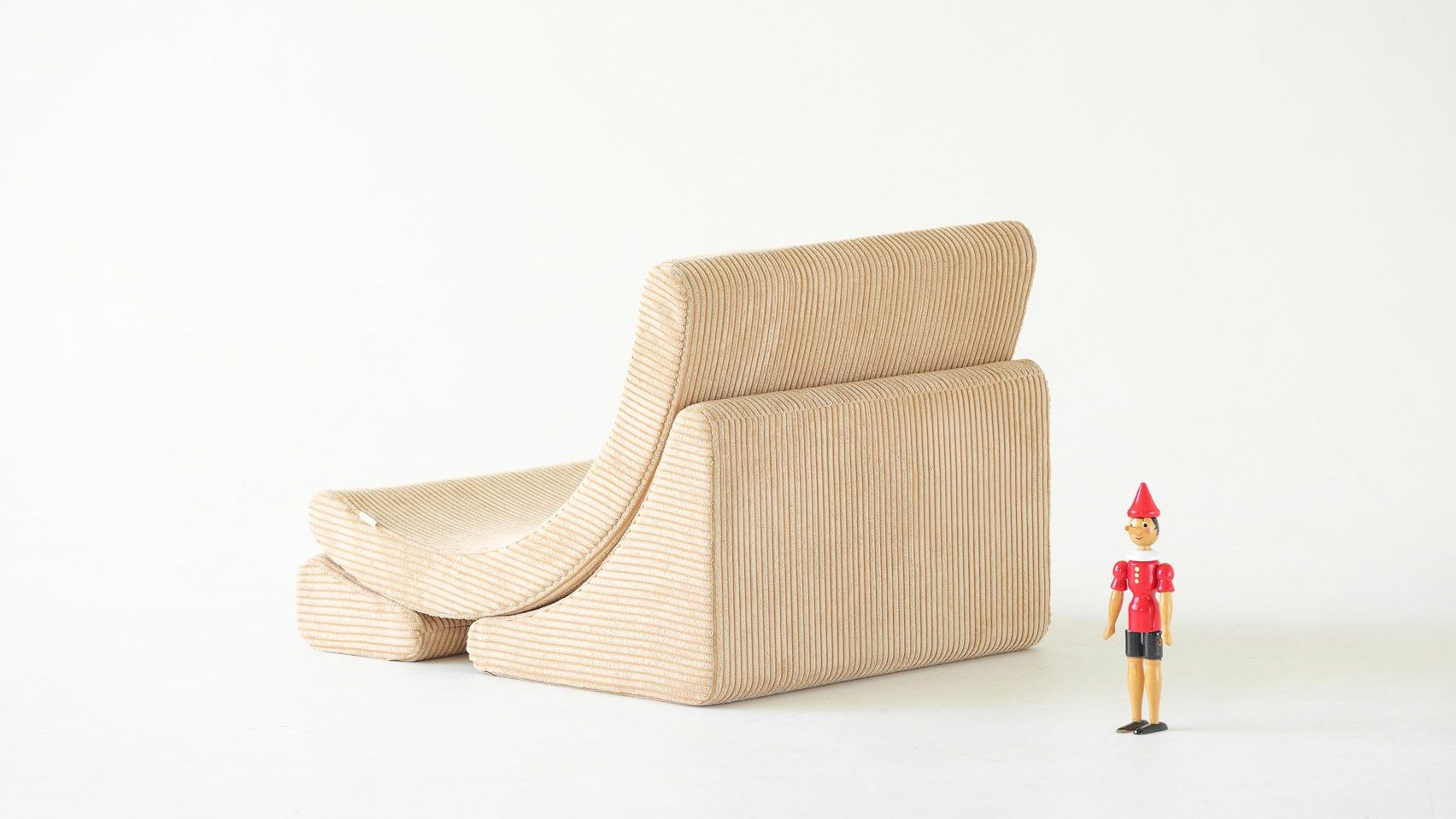 Dezeen Showroom New Releases newsletter features moon-shaped chair