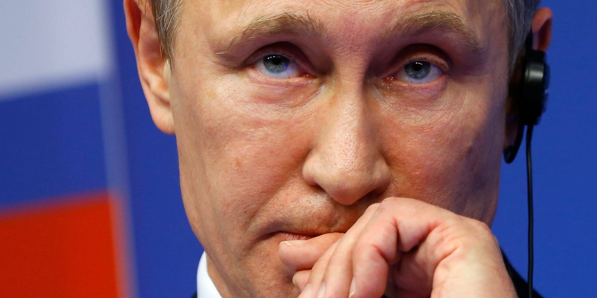 Putin tells Russians there's no reason to panic as the ruble sinks, but analysts say its economy is in trouble