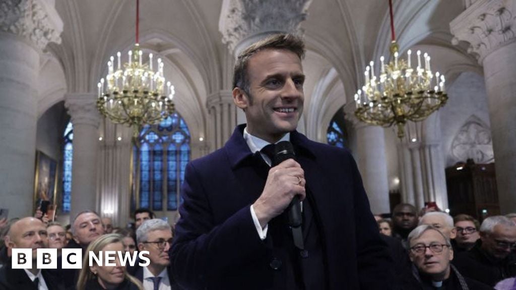 Embattled Macron seeks boost from Notre Dame reopening