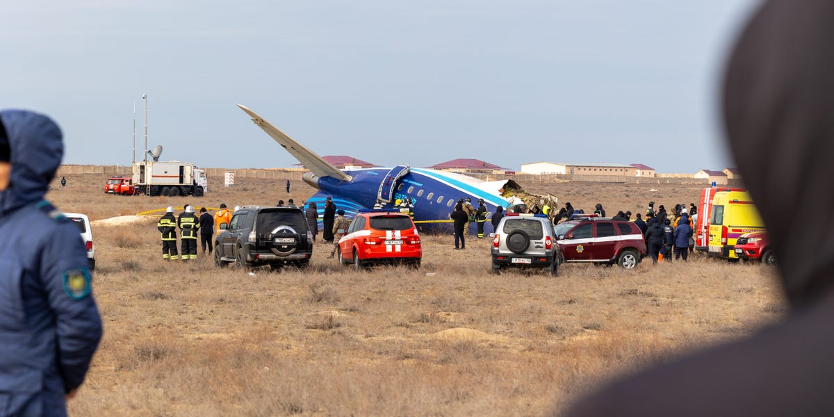 Airline praises pilots in crash-landing where both died but nearly half the passengers survived