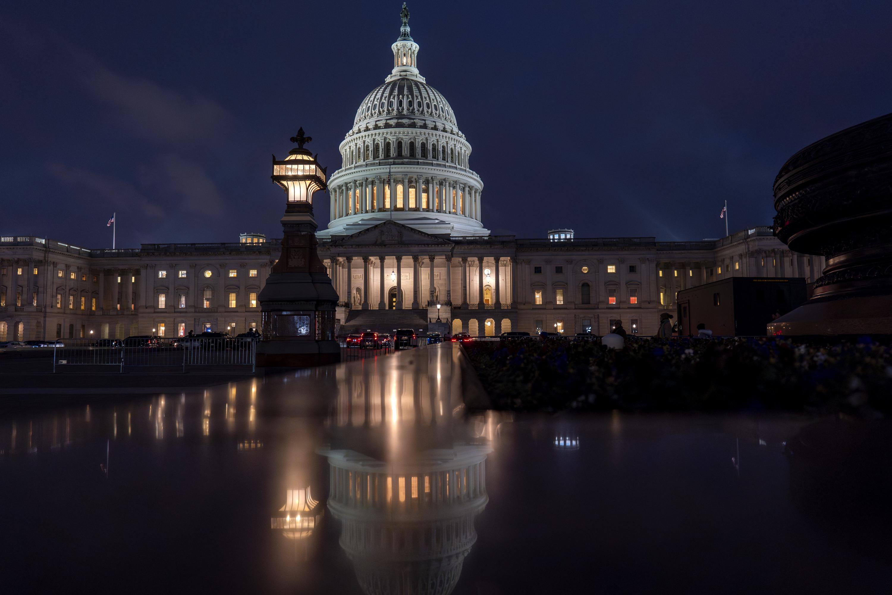 Biden signs bill that averts a government shutdown and brings a close to days of Washington upheaval