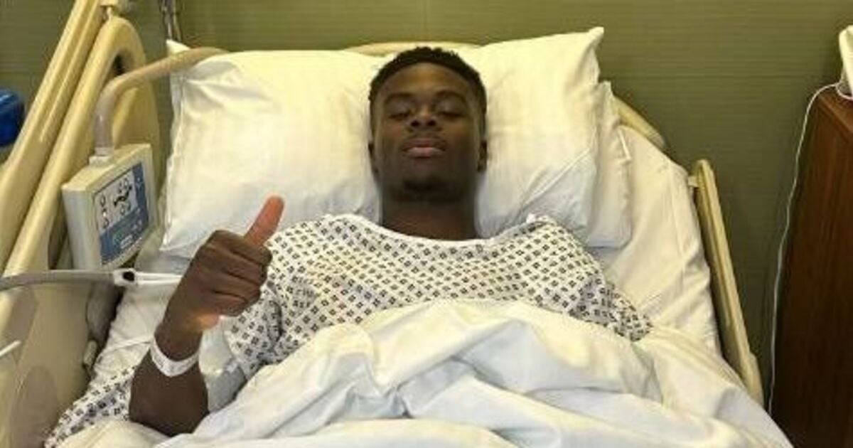 Bukayo Saka gives update as Arsenal star posts picture from hospital bed after surgery