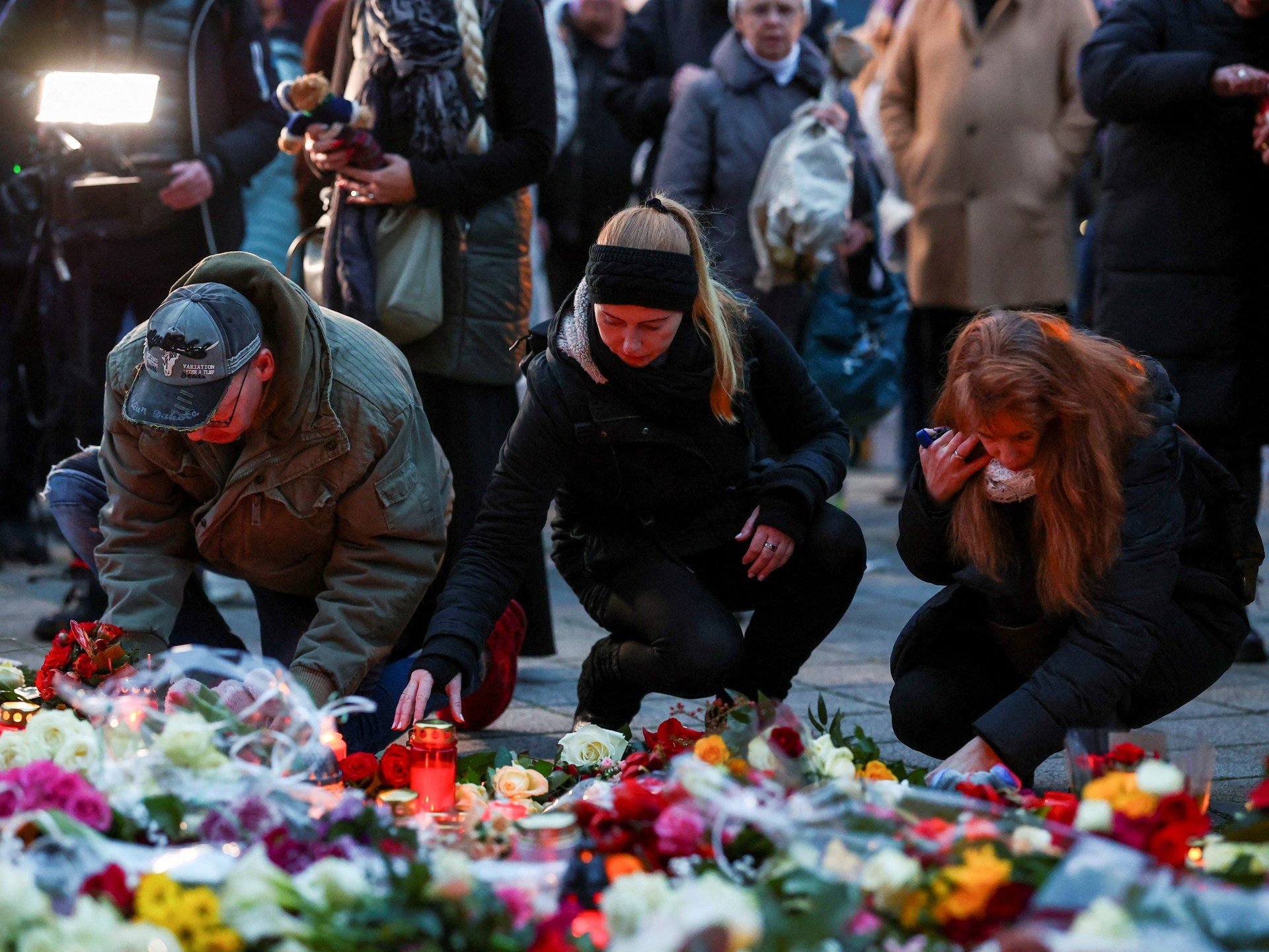 Germans mourn five people killed, 200 injured in Christmas market attack