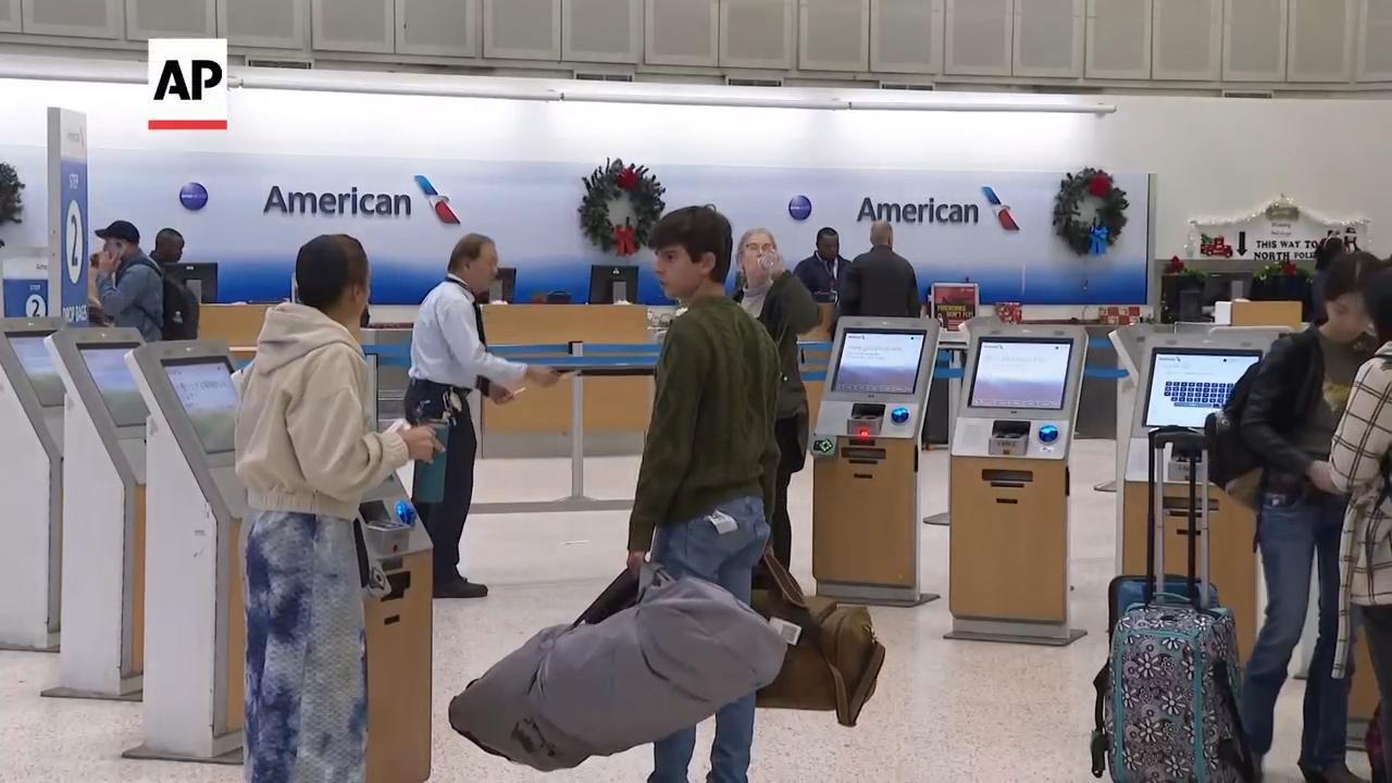 Heavy travel day starts with brief grounding of all American Airlines flights