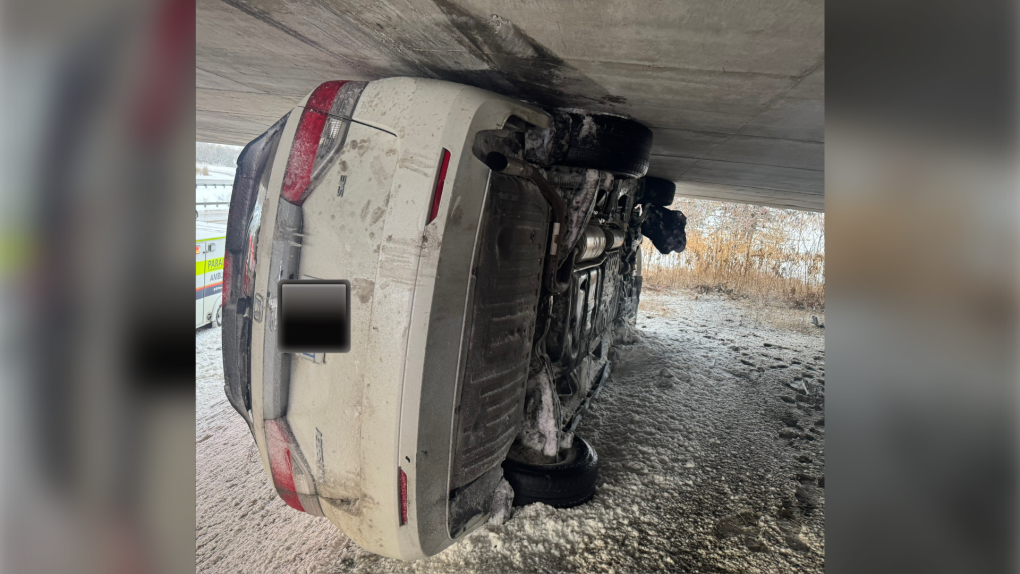 OPP and Ottawa firefighters help remove vehicle wedged into Highway 417 overpass