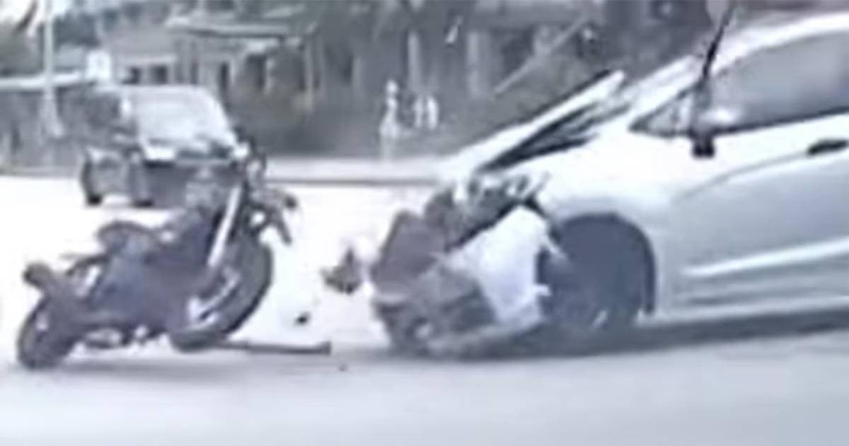 Stamford Road collision sends motorcyclist flying; driver arrested