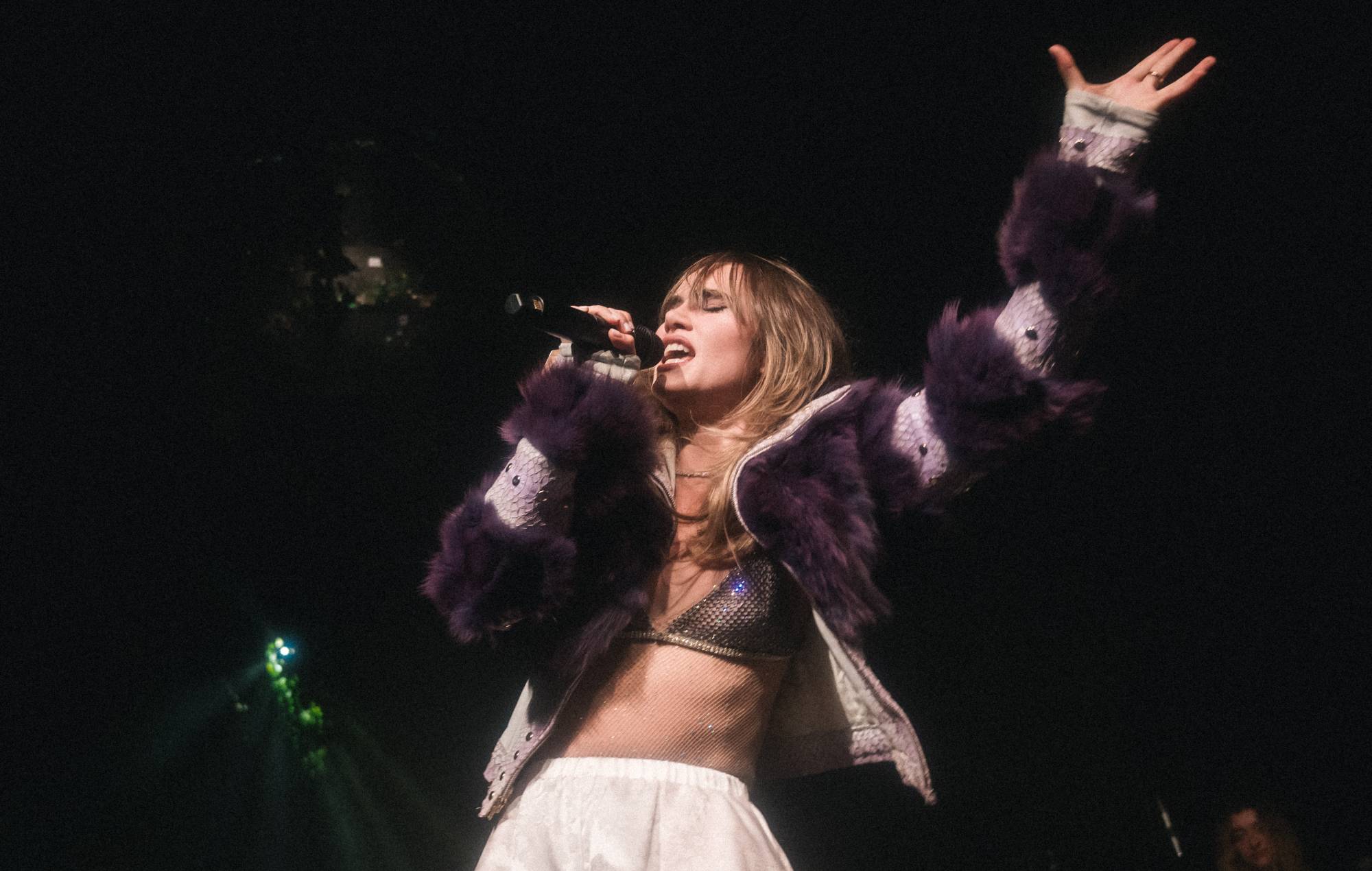 Watch Suki Waterhouse bring out Jane Penny to cover TOPS in Montreal