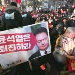 Who is the South Korean leader who tried to impose martial law?