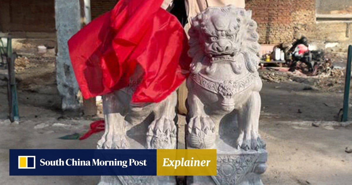 Why red cloth covers guardian stone lions in China during auspicious events