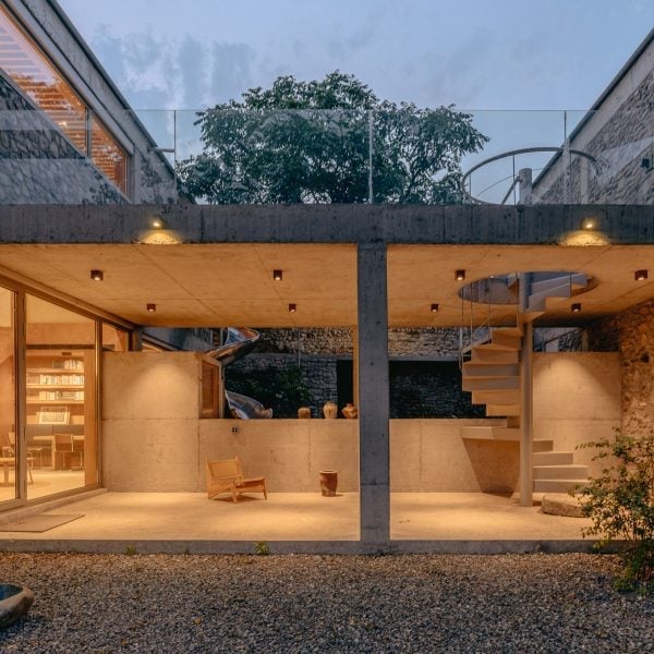 Chaoffice fills concrete grid with reclaimed stone for home in rural China