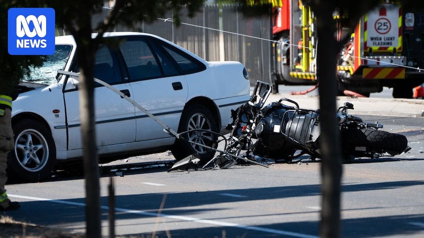 Man charged after motorcyclist killed by car that crossed median strip