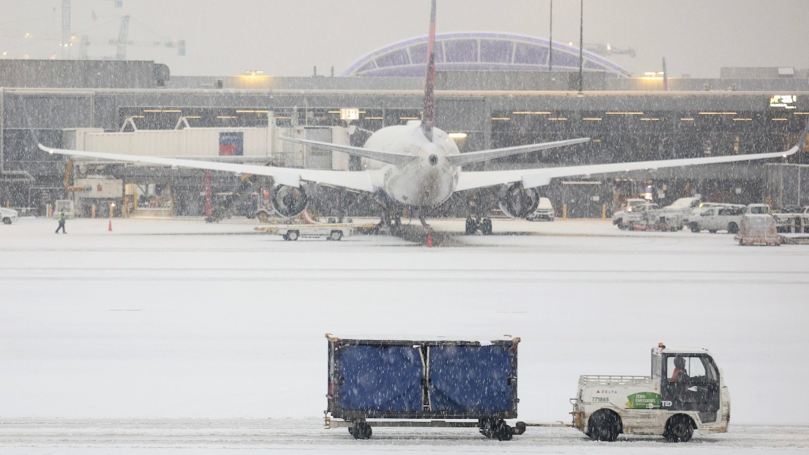 Passengers evacuate plane on slides after Delta flight aborts takeoff