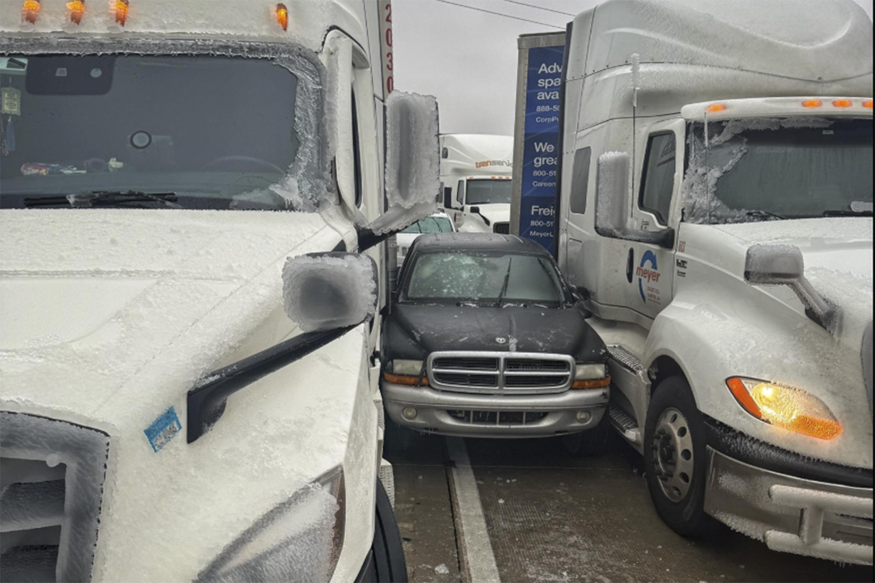 Drivers skid and crash as wintry mix grips central US before moving east