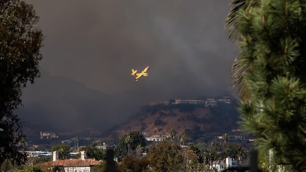 'I've never seen anything like it,' says Quebec pilot helping fight L.A. wildfires