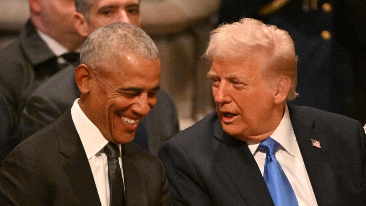 Obama laughs at Trump joke at funeral