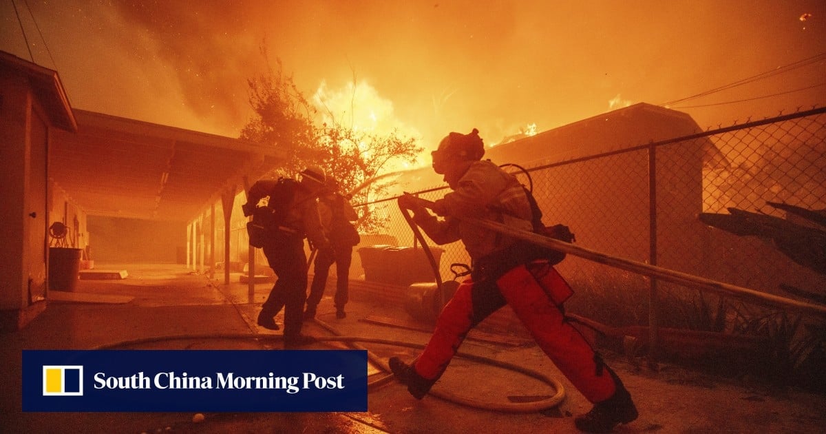 Wildfires rage out of control near Los Angeles, killing at least 2